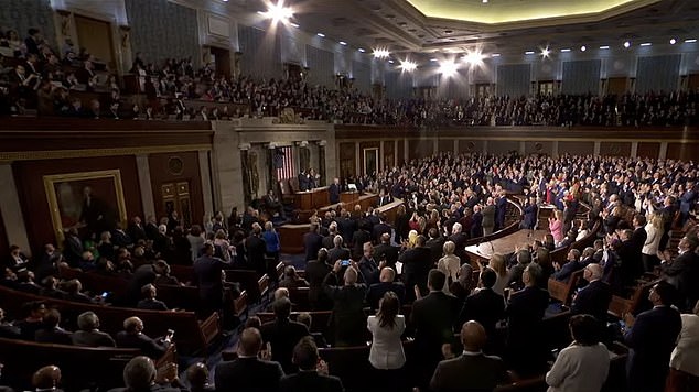 A large number of Democrats (left) stayed seated when the US hockey team was introduced
