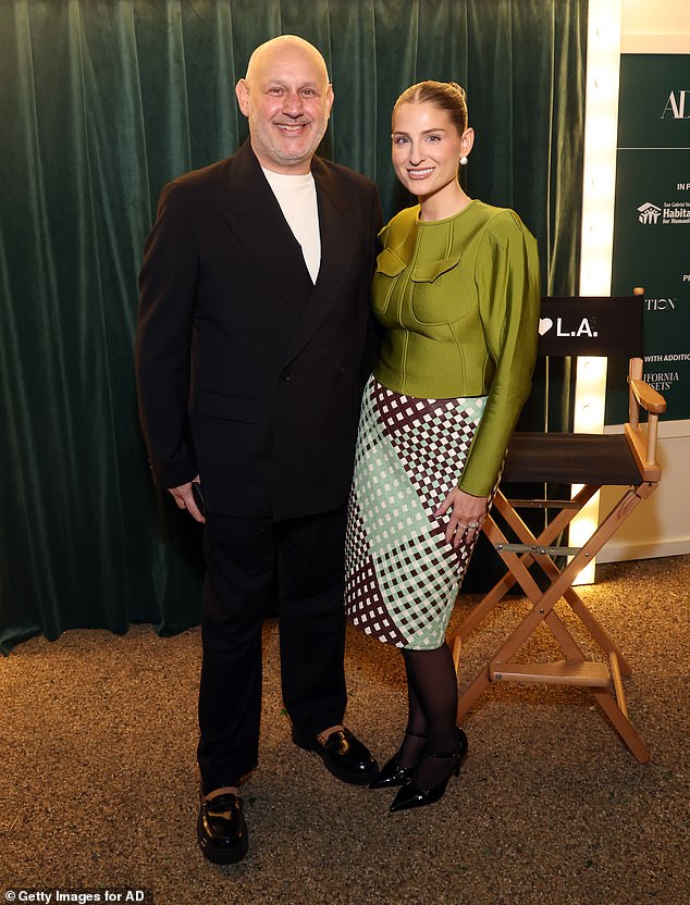 Meghan posed for a pictured with Mayer Rus, west coast AD editor