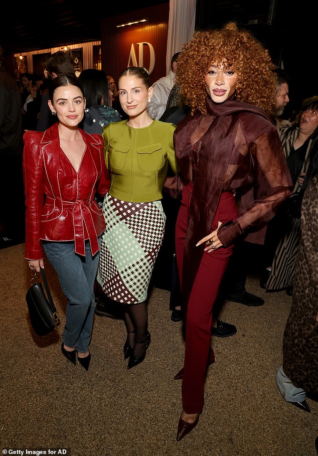 Meanwhile Winnie Harlow turned heads in a stylish burgundy sheer blouse which she teamed with fitted red trousers