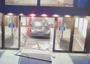 Brit tourist, 36, high on drugs smashes car into hotel doors and then tries to flee before hitting cop car