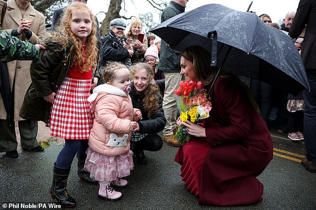 The Princess of Wales crouched to meet children as she accepted bouquets