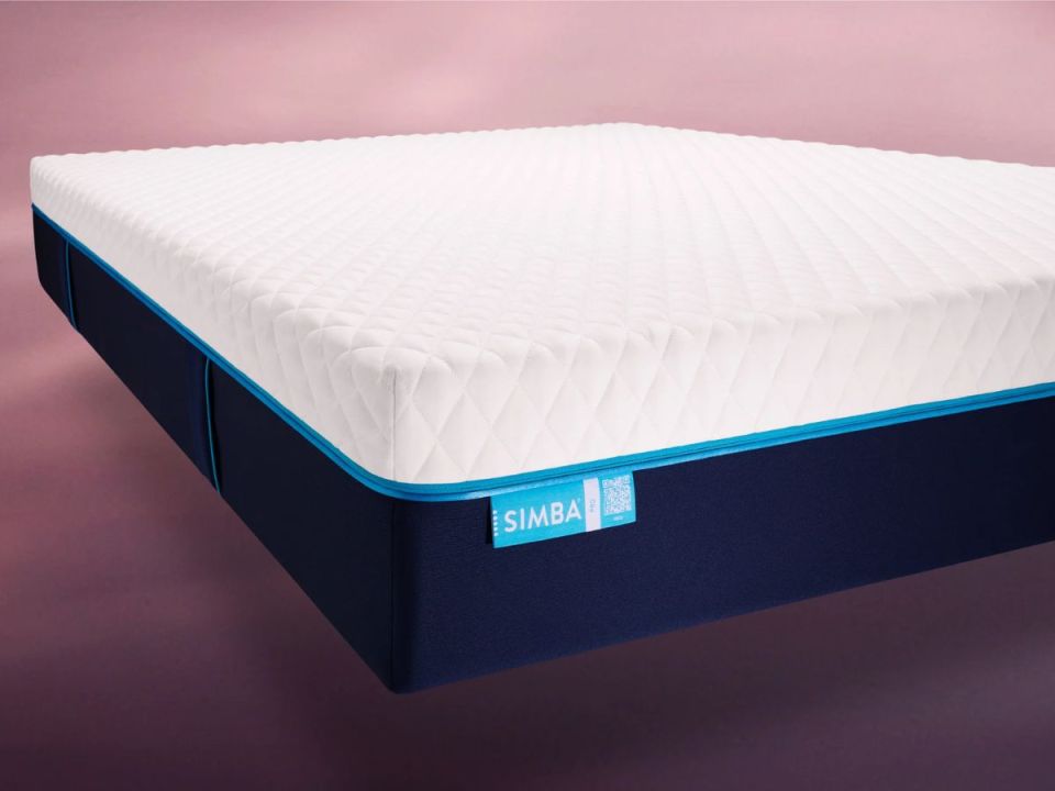Simba mattress with white quilted top and dark blue sides with light blue trim.