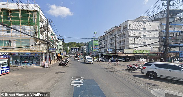 The spot in fornt of the white and green apartment block where Alan Roger Jolliffe was killed in a violent attack
