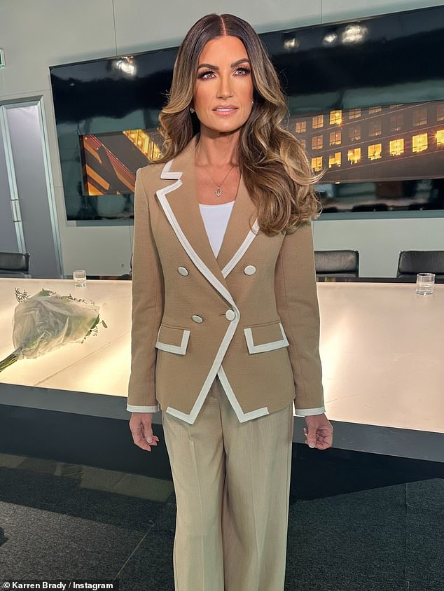 She opted for a chic beige trouser suit as Lord Sugar made an appearance in his boardroom