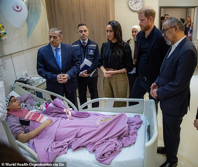 The Duke of Sussex and Meghan, Duchess of Sussex, meet a young medical evacuee during a visit to the Specialty Hospital on February 26, 2026 in Amman, Jordan