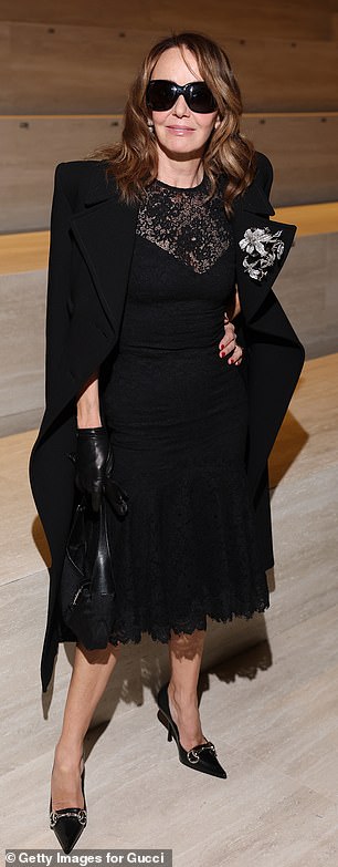 Philippine Leroy-Beaulieu looked stylish in a lace-trimmed black dress with an embroidered coat