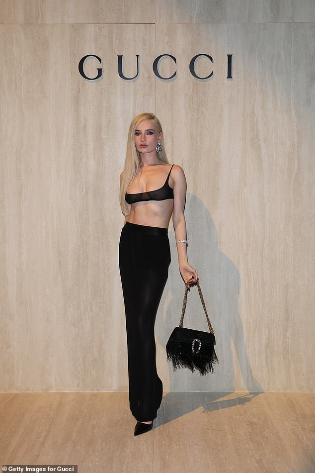 Kim Petras left little to the imagination in a tiny sheer bralet that barely contained her assets and showcased her toned stomach