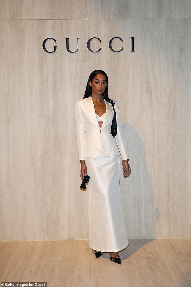 Laura Harrier was a vision in a white bralet paired with a maxi skirt and tailored blazer