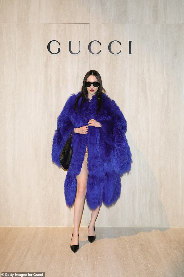Tish Weinstock ensured she wouldn't catch a chill in a furry blue coat
