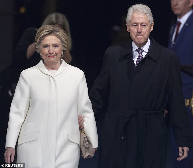 Former president Bill Clinton (R) and former Democratic presidential candidate Hillary Clinton arrive at inauguration ceremonies swearing in Donald Trump as the 45th president of the United States on the West front of the U.S. Capitol in Washington, U.S., January 20, 2017