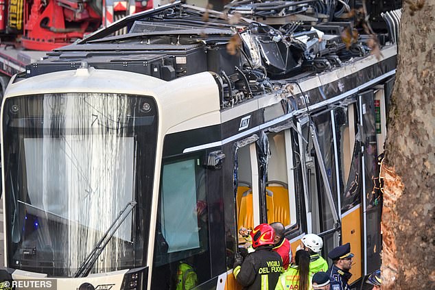 The tram derailed and crashed into a building, smashing the window of a restaurant