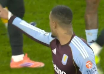 Furious Ezri Konsa held back as he tries to confront someone in stands after Aston Villa's defeat at Wolves
