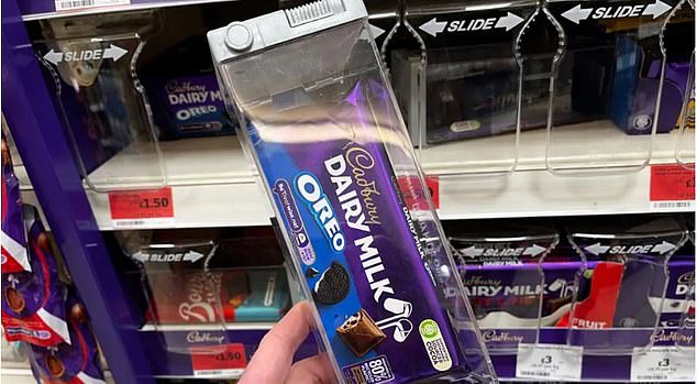 Some chocolate bars are being kept in plastic cases after warnings from police about the threat from thieves