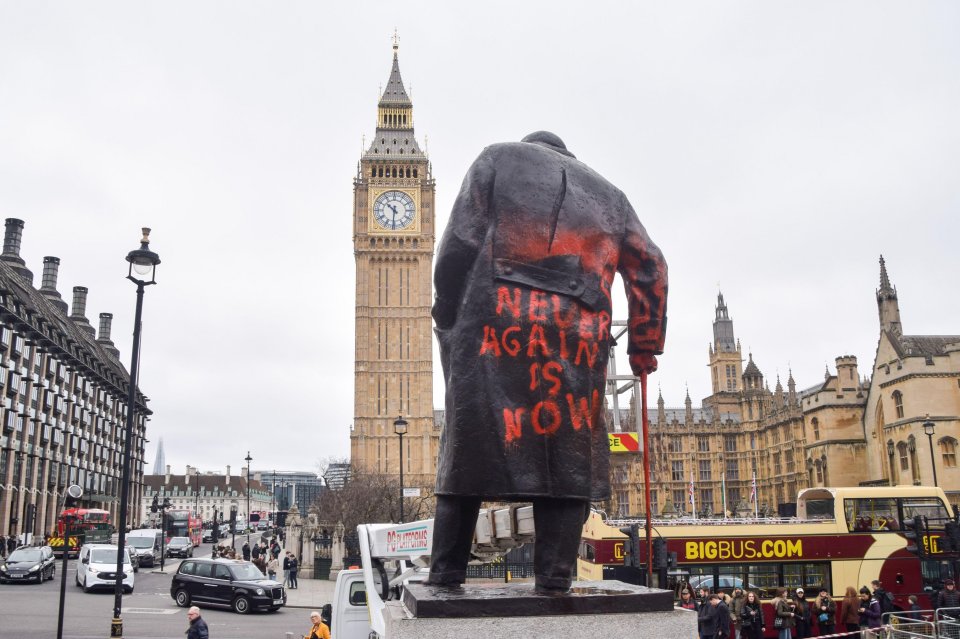 February 27, 2026, London, England, United Kingdom: A worker cleans the statue of Winston Churchill in Parliament Square in London after protesters sprayed red paint and wrote a??Free Palestinea?¿ and other graffiti on it. (Credit Image: ¿ Vuk Valcic