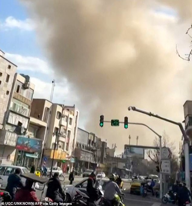 Plumes of smoke rise into the air following a reported explosion in Tehran on February 28, 2026