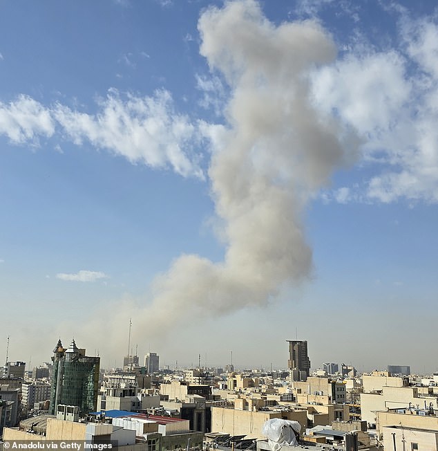 Smoke rises over residential area after an explosion in Tehran, Iran