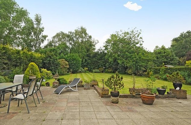 Pictured: Molloy's large back garden. The Farnborough Park Estate - built in 1926 a mile and a half from Orpington centre - is guarded by 24-hour security and has a gated checkpoint by the front entrance