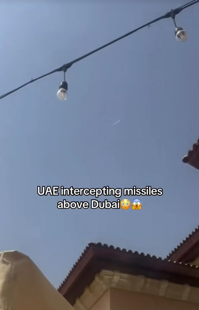 In one video, a Brit can be heard saying, 'That's three missiles, over our heads', while focusing on the white missile streak above.