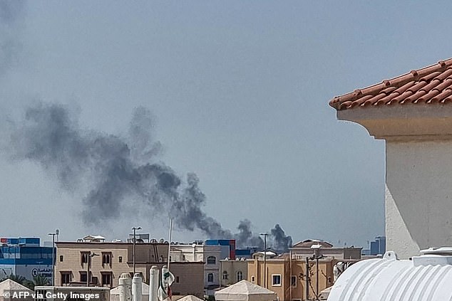 A plume of smoke risin gover Abu Dhabi following in Iranian missile strike on February 28, 2028