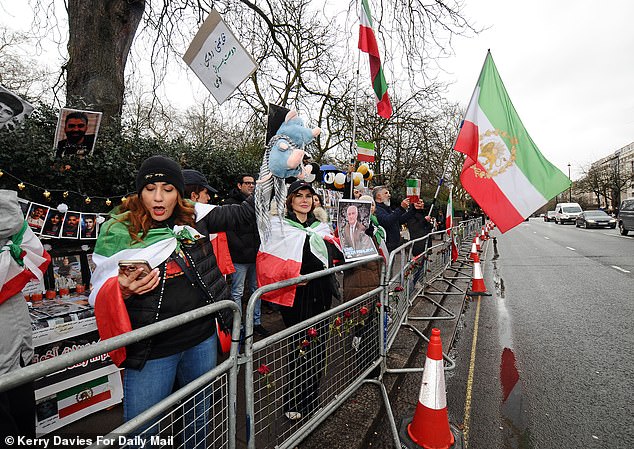 Jubilant protestors outside the Iranian Embassy in London