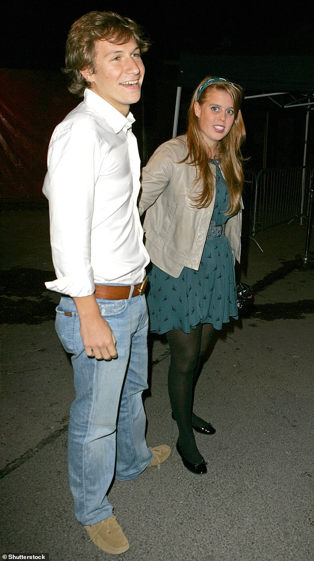 When an invitation was sent to Beatrice - but not by Kate, sources said - it did not mention the dress code, as the princess was left humiliated amid a sea of neon outfits. She is seen here arriving for the bash, wearing a blue frock, with her then-boyfriend Dave Clark