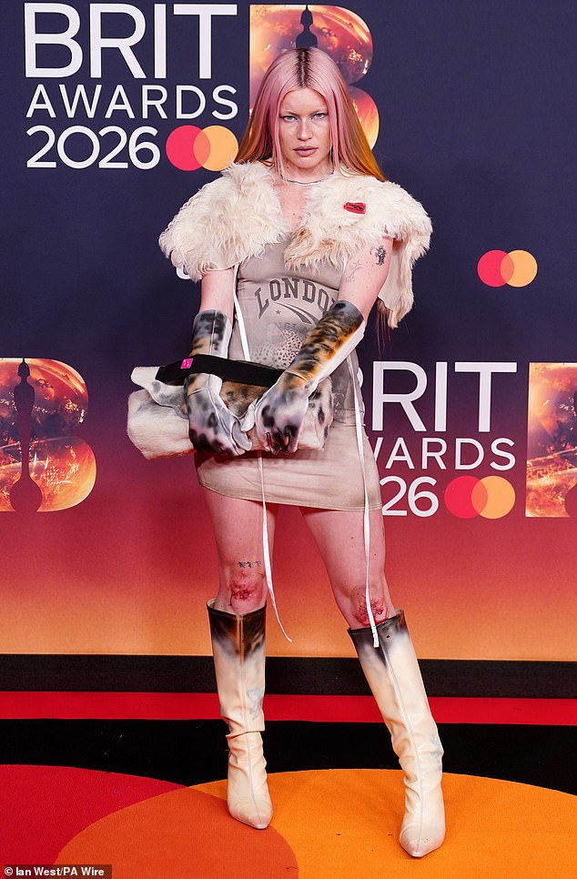 Musician Rhian Teasdale also drew looks on the carpet with her chaotic look, in which she showed off her apparent bloodied knees. Perhaps she fell on the way? Hopefully it's fake blood