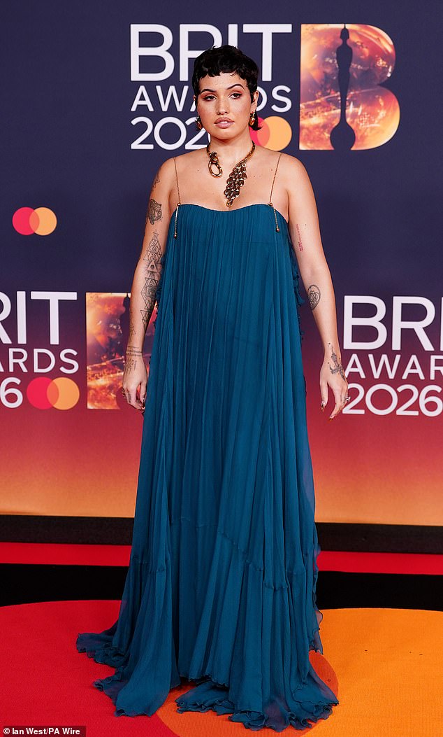 Mabel stunned in an ethereal team frilled gown as she posed on the red carpet