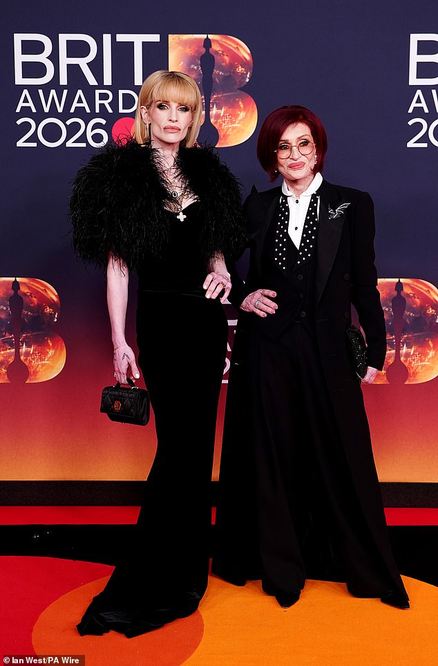 Sharon Osbourne and her daughter Kelly put on a united display as they arrived to accept the honour in memory of Ozzy