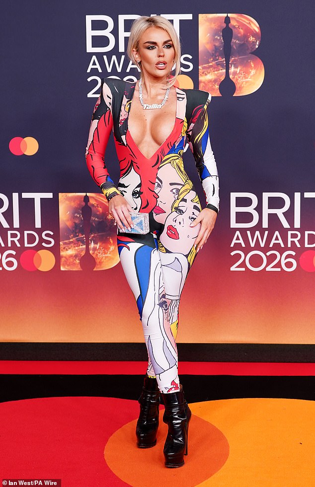 Tallia Storm made a bold statement as she showed off her ample cleavage in a print jumpsuit