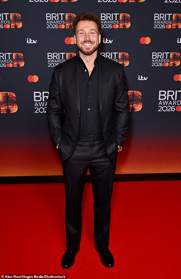 Sam Thompson beamed on the red carpet, despite undergoing throat surgery recently