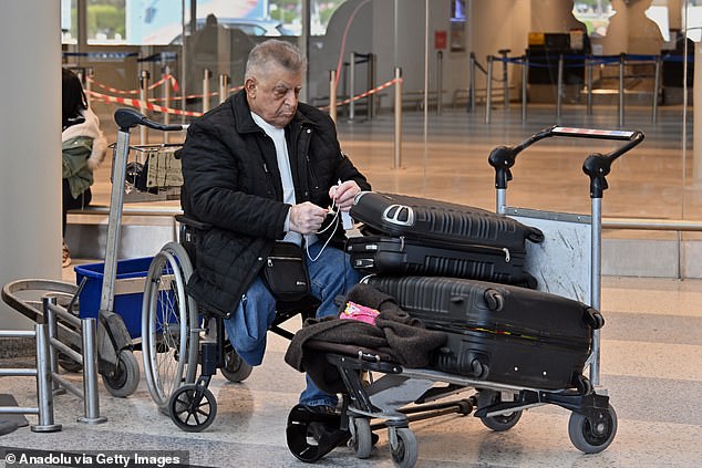 Zayed International Airport (AUH) in Abu Dhabi and Dubai International Airport (DXB) in Dubai are two of the biggest airports in the world. Pictured: A passenger stranded at the airport in Beirut, Lebanon, on Saturday after the missile strikes