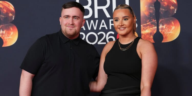 Darts star Luke Littler, 19, steps out on red carpet with girlfriend Faith Millar for BRITs in matching black outfits