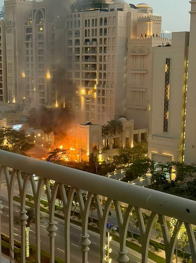 A social media post shows the Palm Jumeirah Fairmont Hotel in the popular tourist destination of Dubai, UAE on fire Saturday after an Iranian rocket strike