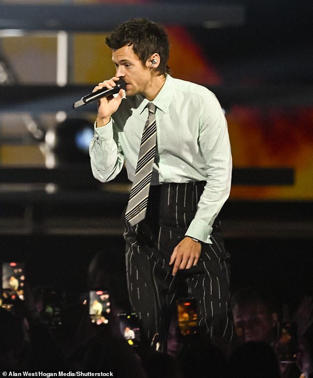 The singer, 32, send fans wild as he made his first red carpet appearance and much anticipated return to the stage following a three year career break