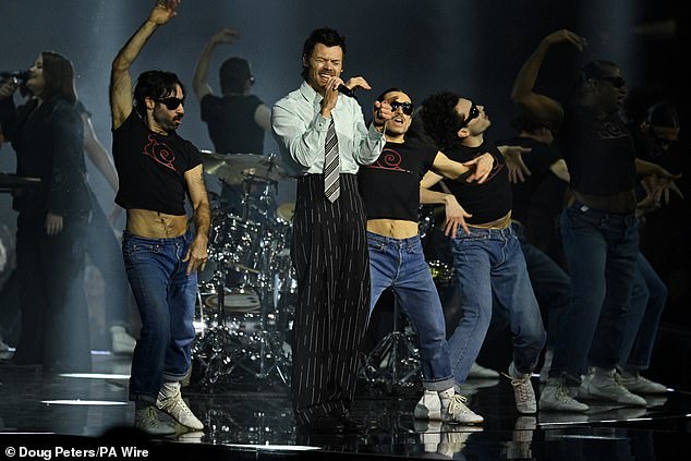 As he strutted his stuff on stage fans, who had been eagerly-awaiting the performance, rushed to social media, gushing: 'He is so back!'