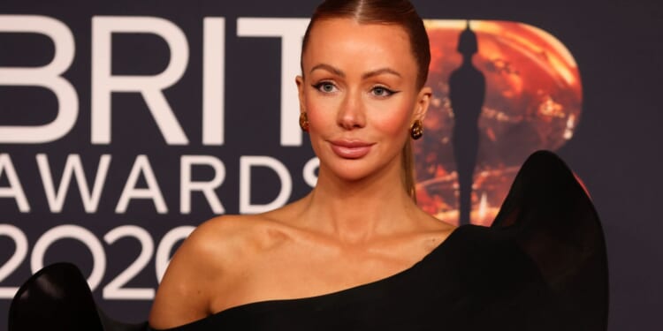 Olivia Attwood stuns in black leggy gown at Brit Awards before reuniting with pal Pete Wicks at ceremony