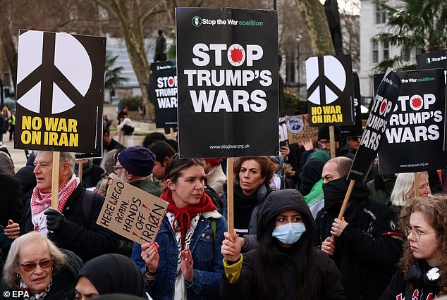 The crowds of activists (pictured) gathered to condemn US and Israel's missile strikes on the capital of Tehran and other targets across the nation. Many bore placards (pictured) reading 'Stop Trump's Wars'