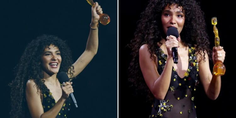 Olivia Dean breaks down in tears at Brit Awards as she takes home FOUR major gongs