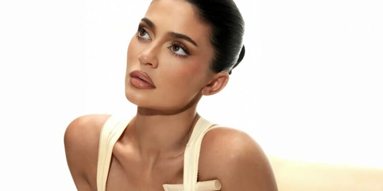 Stunning Kylie Jenner turns up the heat in a mini dress while promoting her beauty empire