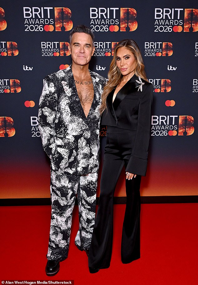 Robbie Williams and Ayda Field posed together as they arrived at the ceremony at the same time as Sharon and Kelly