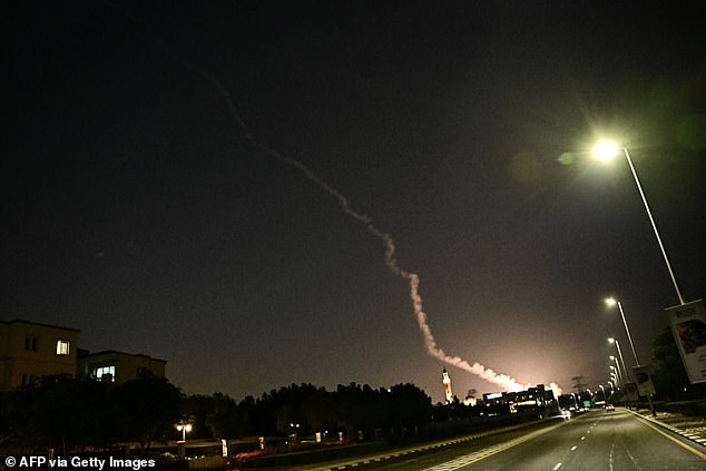Smoke seen from a rocket in the sky over Dubai on Saturday which was reportedly intercepted by UAE defences