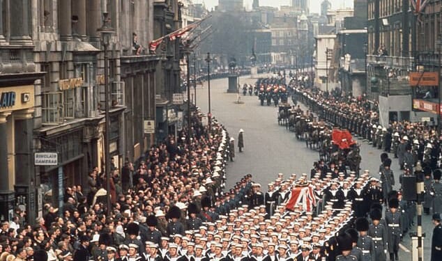 Sir Winston Churchill's coffin is carried down Whitehall during his state funeral on January 30, 1965