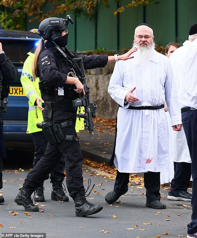 Rabbi Daniel Walker (pictured right) leapt into action after the Heaton Park Hebrew Congregation Synagogue came under attack