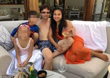 Mr Griffiths pictured with his ex-wife Ploy Kringsinthanakun and their two children