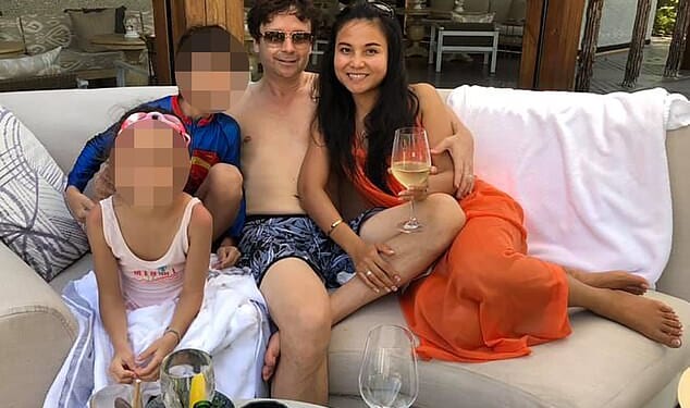 Mr Griffiths pictured with his ex-wife Ploy Kringsinthanakun and their two children