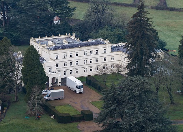 Removal vans parked at the front of Royal Lodge in Berkshire which is now empty of Royals after it was reported that Andrew Mountbatten-Windsor had left and moved to Sandringham