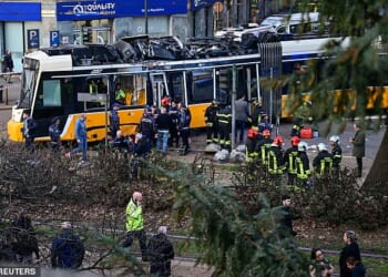 At least one person has died and dozens have been injured after a tram derailed and crashed into a building in Milan