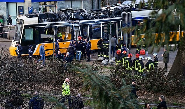 At least one person has died and dozens have been injured after a tram derailed and crashed into a building in Milan
