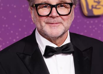 Director of Bafta-winning film I Swear Kirk Jones (pictured) said John Davidson was 'let down' after his racist outburst was broadcast during the BBC's coverage of the ceremony