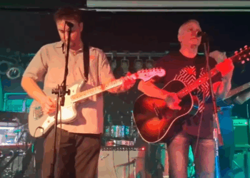 Brit indie rocker shocks pub punters as he performs in cover band with dad and brother